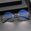 Jarek Titanium Rimless Oval Glasses Frames